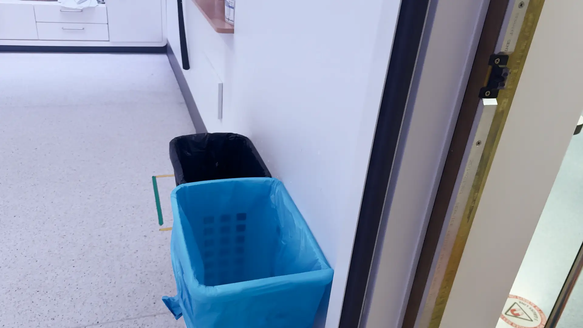 Acoustic Barn Door Open Position In the open position the acoustic barn door would rest in the space between the window and door opening in the MRI scanning room.