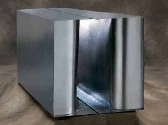 Ruskin produces reactive silencers that capture sound energy within a series of tuned chambers, which are specifically designed to resonate at certain frequencies. When sound waves enter these chambers, the internal shape and size of each cavity cause a shift in the phase of the sound waves. This phase shift cancels out the tuned frequencies, weakening the sound as it moves through the silencer. Rather than absorbing the sound, they convert and neutralize it by manipulating how it moves through the air within the duct system. Minimizing cross-talk is important as sound can travel between rooms or spaces through shared ductwork. Duct silencers help block sound transmission between rooms, improving privacy and reducing distractions in settings like offices and hospitals. Suitable for clean room and hospital settings.